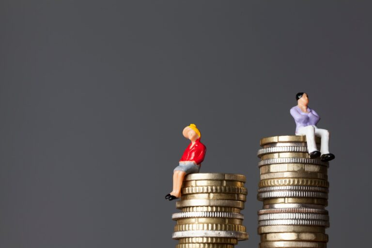 Man Woman Pile Of Coins Gender Wage Gap