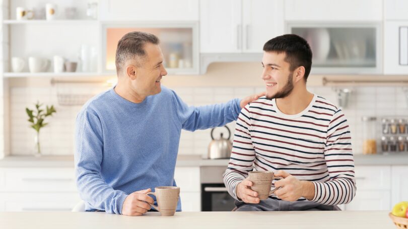 Father Son Having Coffee Kitchen Bonding