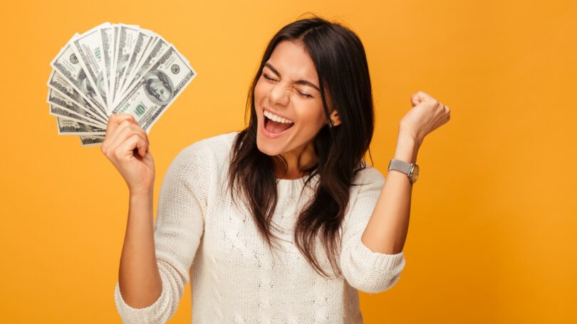 Woman Cheering Money Celebrating