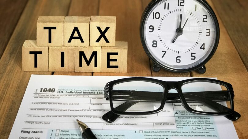 Tax Time Tax Forms Glasses Clock Letter Blocks