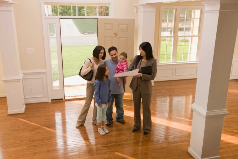 Realtor Showing Family A Home