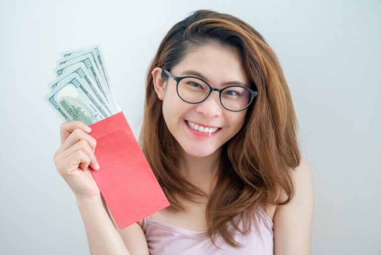 Woman Holding Envelope Cash